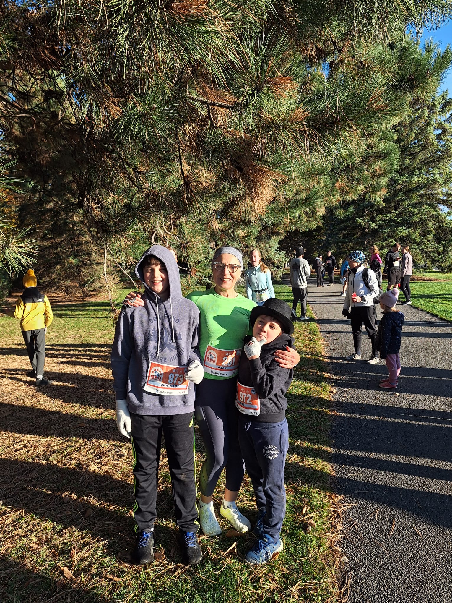 Staying active during menopause at 65 - a fit grandmother with two grandsons at Cookie Run in Ottawa