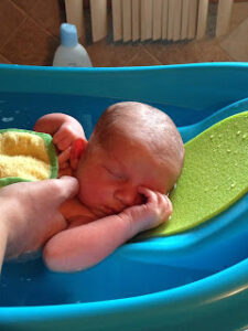 Staying active during menopause- bathtime boding  helps maintain energy for grandchildren - bath time bonding